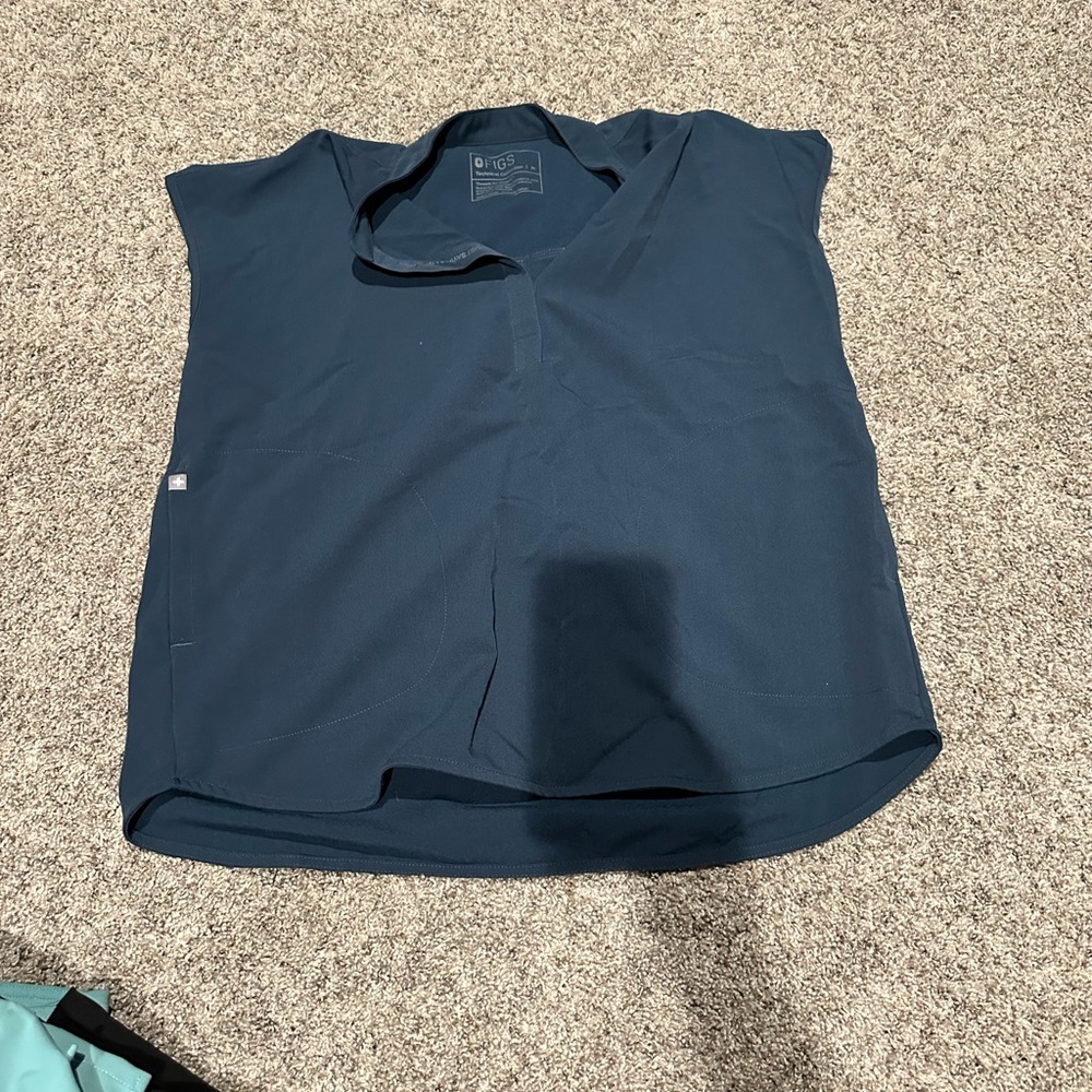 Five medium Figs scrub tops. All in good condition.